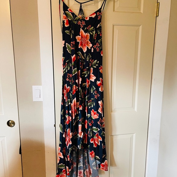 Barely worn floral maxi dress. V line front.